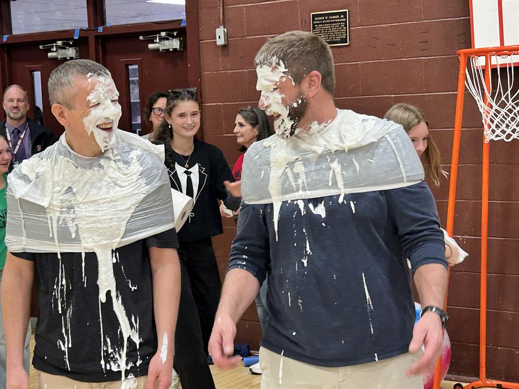 Spirit week assembly at GHS teachers get pied in the face