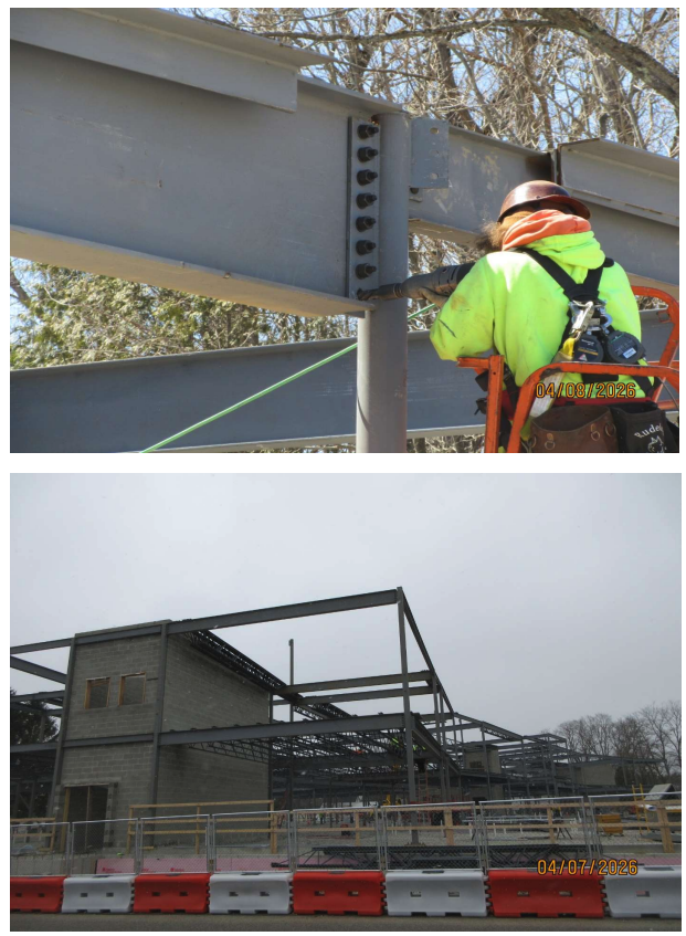 more steel framing and a worker fastening the bolts to keep the steel together